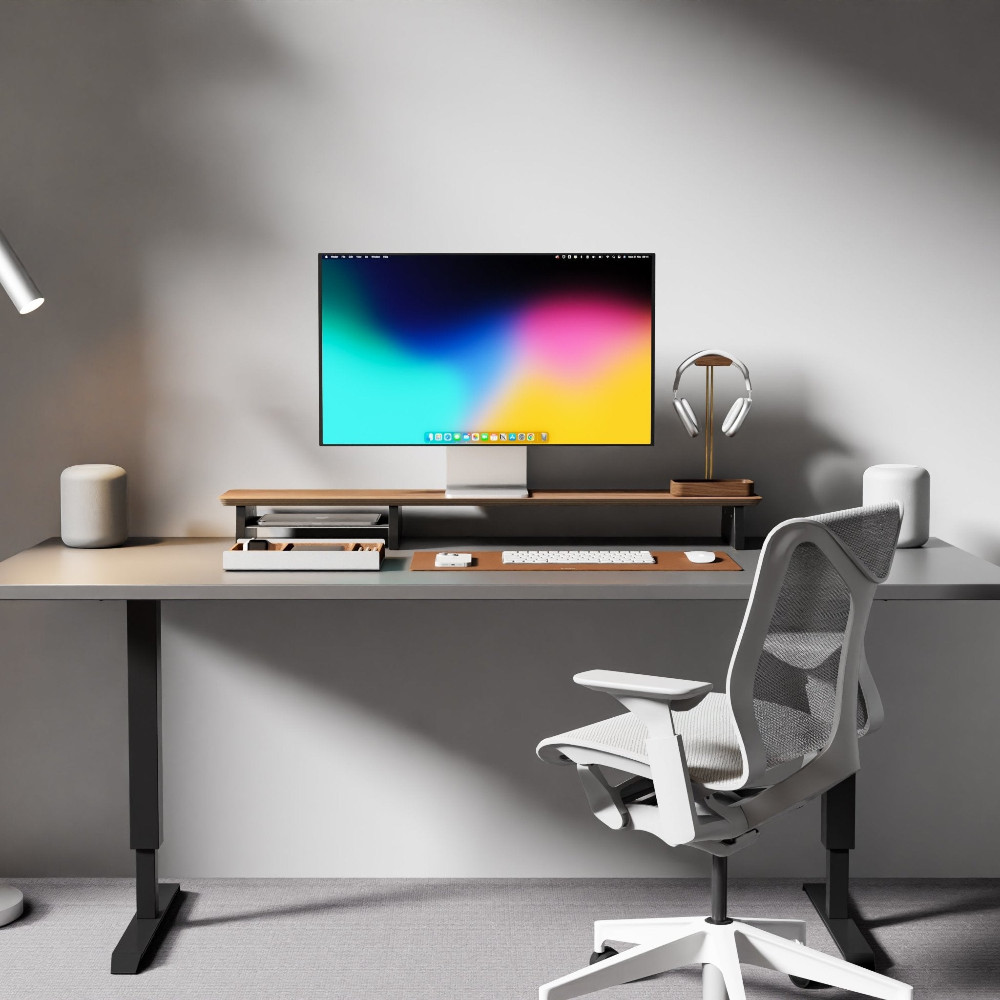 walnut desk shelf from Raico in a minimal desk setup with brown leather desk mat, a walnut headphone stand and a matching desk tray drawer to keep small desk items organised